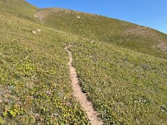 03D The trail gradually climbs higher on the shoulder of Pik Petrovski on day hike from Ak-Sai Travel Lenin Peak Base Camp 3600m